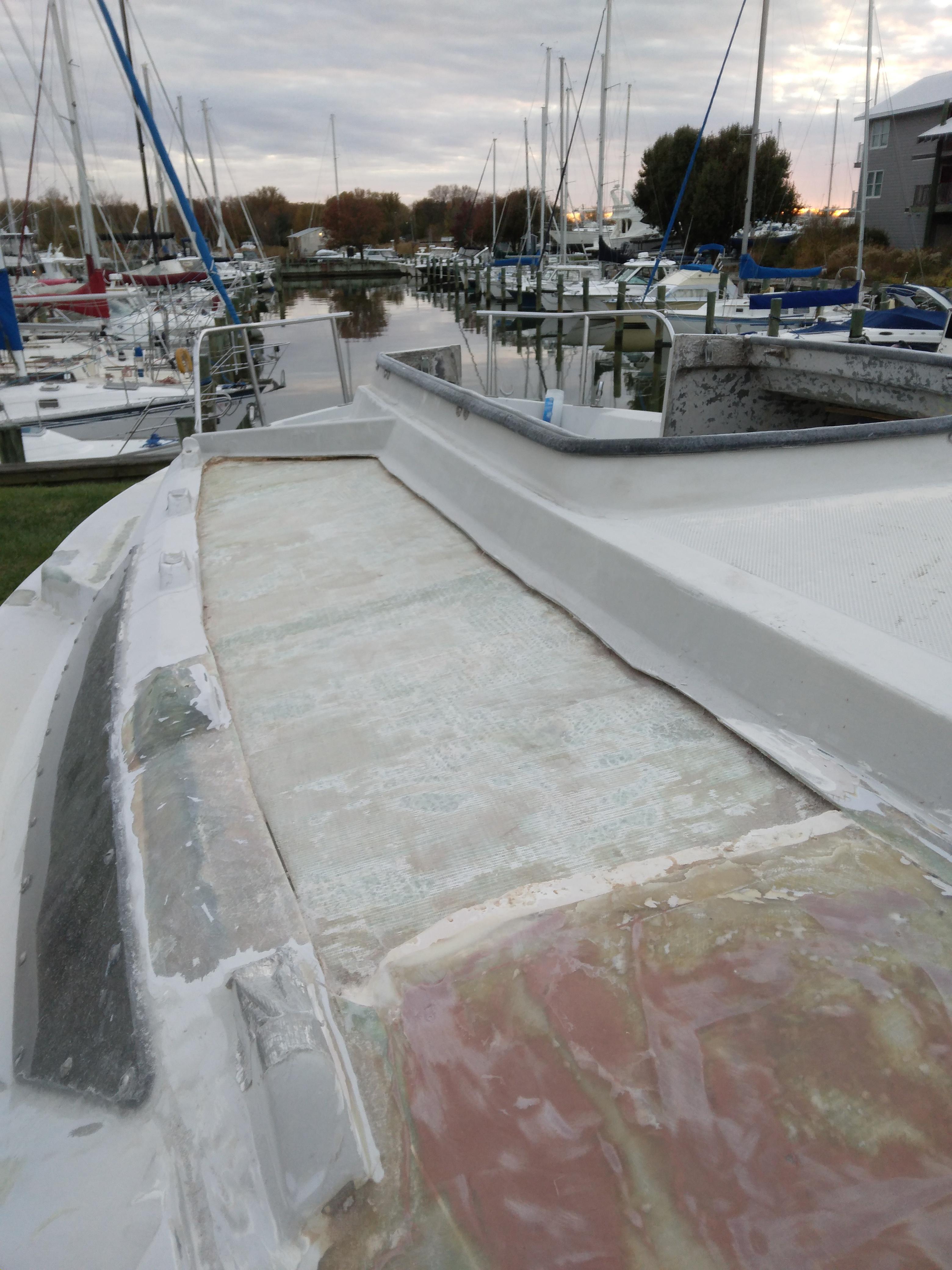 facing aft, I have removed the skin where possible and was able to sand down and reuse portions. Once the old material was removed and sanded down, I began the process of fairing the deck to prepare for recoring